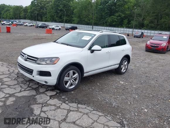 ✅ 2012 Volkswagen Touareg Sport • VIN: WVGEF9BP0CD006506 • Lot: 42355432. Wystawiony na IAAI z przebiegiem 175 346 mil. Bezpłatny archiwum sprzedaży aukcyjnych z USA i szczegółowy raport historii pojazdu na DreamBid. Zdjęcie 2.