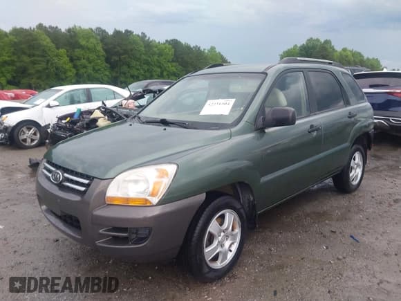 ✅ 2006 Kia Sportage LX • VIN: KNDJF724467285085 • Лот: 42231504. Опубликован ранее на IAAI с пробегом 165 424 миль. Бесплатный доступ к архиву аукционных продаж из США и подробный отчёт об истории автомобиля на DreamBid. Изображение 2.