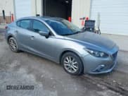 ✅ 2015 Mazda 3 i Touring • VIN: 3MZBM1V74FM144856 • Lot: 42570180. Listed on IAAI with 132,573 mi. Free auction sales archive from the USA and detailed vehicle history report at DreamBid. Image 1.
