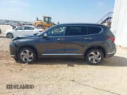 ✅ 2021 Hyundai Santa Fe SEL • VIN: 5NMS64AJ2MH309948 • Lot: 43392363. Listed on IAAI with 29,182 mi. Free auction sales archive from the USA and detailed vehicle history report at DreamBid. Image 14.