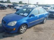 ✅ 2009 Kia Rio LX • VIN: KNADE223596456850 • Lot: 43255869. Wystawiony na IAAI z przebiegiem 214 486 mil. Bezpłatny archiwum sprzedaży aukcyjnych z USA i szczegółowy raport historii pojazdu na DreamBid. Zdjęcie 17.