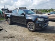 ✅ 2021 Chevrolet Colorado 4WD Z71 • VIN: 1GCGTDEN1M1112808 • Lot: 64644555. Listed on Copart with 84,751 mi. Free auction sales archive from the USA and detailed vehicle history report at DreamBid. Image 4.