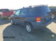 ✅ 2003 Ford Escape XLT Popular 2 • VIN: 1FMYU93193KC87505 • Lot: 43532686. Listed on IAAI with 138,748 mi. Free auction sales archive from the USA and detailed vehicle history report at DreamBid. Image 3.