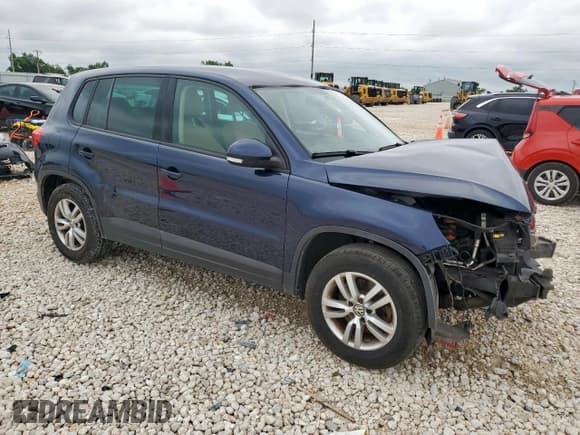 ✅ 2012 Volkswagen Tiguan SE • VIN: WVGAV7AX0CW590384 • Lot: 59136155. Listed on Copart with 129,726 mi. Free auction sales archive from the USA and detailed vehicle history report at DreamBid. Image 4.