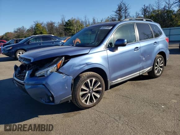2018 Subaru Forester Touring с VIN JF2SJGWC3JH594474, выставлен на аукционе Copart как лот 82251465 с пробегом 57 066 миль миль и Списание • Salvage title. История ставок и продаж доступна на DreamBid. Изображение 1.