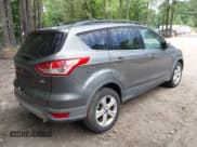 ✅ 2013 Ford Escape SE • VIN: 1FMCU9G98DUA18377 • Lot: 42184396. Listed on IAAI with 215,979 mi. Free auction sales archive from the USA and detailed vehicle history report at DreamBid. Image 4.