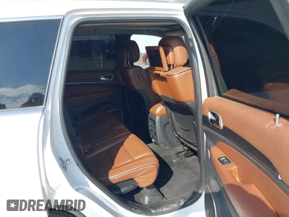 ✅ 2015 Jeep Grand Cherokee Summit • VIN: 1C4RJEJG5FC105296 • Lot: 43231201. Listed on IAAI with 124,311 mi. Free auction sales archive from the USA and detailed vehicle history report at DreamBid. Image 8.