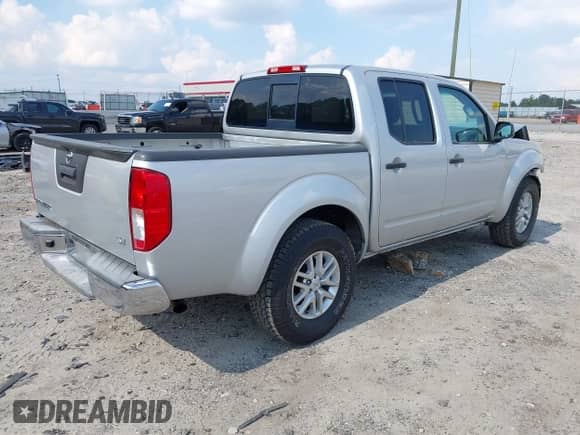 2014 Nissan Frontier Desert Runner z VIN 1N6AD0ER0EN733673, wystawiony jako IAAI lot #43260104 z przebiegiem 163 382 mil mil oraz . Historia ofert i sprzedaży dostępna na DreamBid. Obrazek 4.