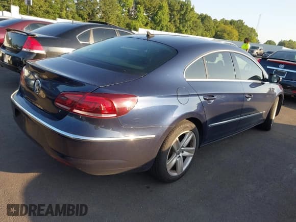 ✅ 2015 Volkswagen CC Sport • VIN: WVWBN7AN9FE800563 • Lot: 42797333. Wystawiony na IAAI z przebiegiem 145 822 mil. Bezpłatny archiwum sprzedaży aukcyjnych z USA i szczegółowy raport historii pojazdu na DreamBid. Zdjęcie 4.