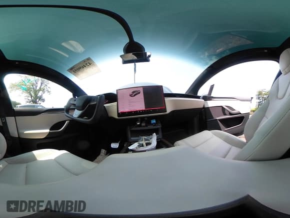 ✅ 2023 Tesla Model X • VIN: 7SAXCBE55PF411222 • Lot: 42469051. Listed on IAAI with 17,389 mi. Free auction sales archive from the USA and detailed vehicle history report at DreamBid. Image 21.