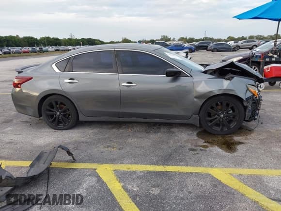 ✅ 2018 Nissan Altima SL • VIN: 1N4AL3AP5JC182311 • Lot: 43628576. Listed on IAAI with 117,950 mi. Free auction sales archive from the USA and detailed vehicle history report at DreamBid. Image 14.