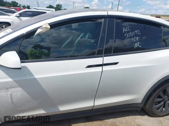 ✅ 2023 Tesla Model X Plaid • VIN: 7SAXCBE65PF418602 • Lot: 42956757. Listed on IAAI with 44,161 mi. Free auction sales archive from the USA and detailed vehicle history report at DreamBid. Image 13.