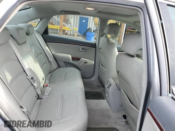 2006 Hyundai Azera SE z VIN KMHFC46F36A087430, wystawiony jako Copart lot #50927485 z przebiegiem 102 868 mil mil oraz Szkoda całkowita • Salvage title. Historia ofert i sprzedaży dostępna na DreamBid. Obrazek 10.