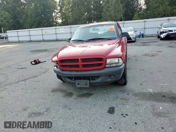2003 Dodge Dakota Sport with VIN 1D7HL38XX3S275337, listed as a Copart auction lot 80963815 with 274,880 mi miles and Salvage title. Bid and sale history available at DreamBid. Image 13.