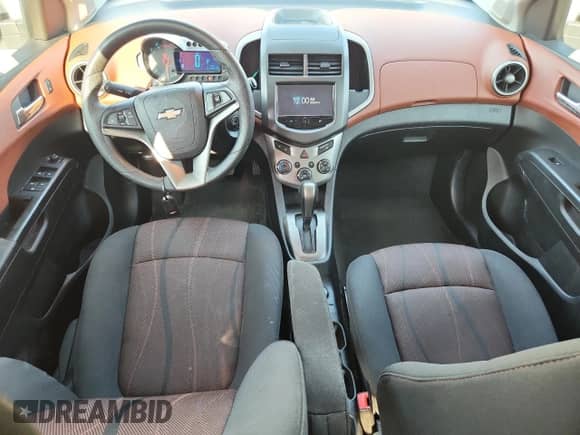 2015 Chevrolet Sonic LT с VIN 1G1JC6SB0F4151833, выставлен на аукционе Copart как лот 80561405 с пробегом 145 990 миль миль и Чистый • Clean title. История ставок и продаж доступна на DreamBid. Изображение 8.