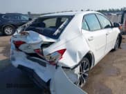 ✅ 2018 Toyota Corolla SE • VIN: 5YFBURHE4JP784756 • Lot: 43242584. Listed on IAAI with 146,571 mi. Free auction sales archive from the USA and detailed vehicle history report at DreamBid. Image 4.