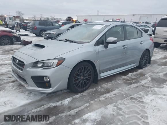 ✅ 2016 Subaru WRX STI • VIN: JF1VA2V69G9807172 • Lot: 43916467. Listed on IAAI with 32,339 mi. Free auction sales archive from the USA and detailed vehicle history report at DreamBid. Image 2.