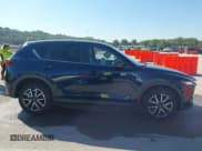 ✅ 2018 Mazda CX-5 Touring • VIN: JM3KFACM5J1473522 • Lot: 43315278. Listed on IAAI with 56,327 mi. Free auction sales archive from the USA and detailed vehicle history report at DreamBid. Image 13.