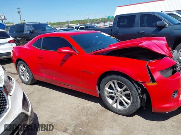 ✅ 2015 Chevrolet Camaro LS • VIN: 2G1FA1E39F9135890 • Lot: 42106898. Listed on IAAI with 160,945 mi. Free auction sales archive from the USA and detailed vehicle history report at DreamBid. Image 13.