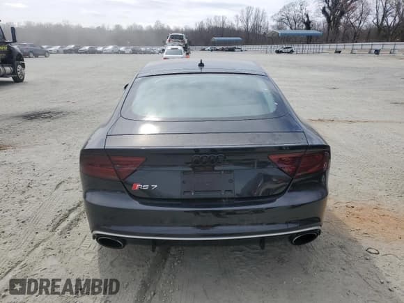 ✅ 2015 Audi RS 7 • VIN: WUAW2CFC0FN900483 • Лот: 47700525. Опубликован ранее на Copart с пробегом 107 260 миль. Бесплатный доступ к архиву аукционных продаж из США и подробный отчёт об истории автомобиля на DreamBid. Изображение 6.