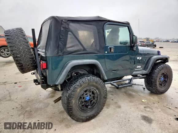 2005 Jeep Wrangler X с VIN 1J4FA39S35P333959, выставлен на аукционе Copart как лот 59576665 с пробегом 261 856 миль миль и Списание • Salvage title. История ставок и продаж доступна на DreamBid. Изображение 3.
