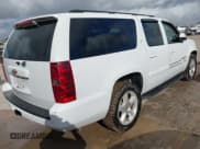 ✅ 2007 Chevrolet Suburban LTZ • VIN: 3GNFC16J47G100560 • Lot: 42432799. Listed on IAAI with 233,595 mi. Free auction sales archive from the USA and detailed vehicle history report at DreamBid. Image 4.