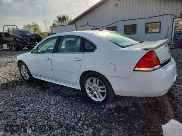 ✅ 2011 Chevrolet Impala LTZ • VIN: 2G1WC5EM2B1183668 • Lot: 84771575. Listed on Copart with 94,995 mi. Free auction sales archive from the USA and detailed vehicle history report at DreamBid. Image 2.