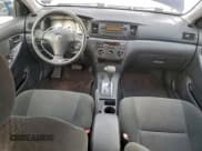 ✅ 2005 Toyota Corolla LE • VIN: 2T1BR32E25C477776 • Лот: 94157155. Опубликован ранее на Copart с пробегом 107 709 миль. Бесплатный доступ к архиву аукционных продаж из США и подробный отчёт об истории автомобиля на DreamBid. Изображение 8.