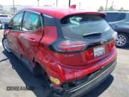 ✅ 2022 Chevrolet Bolt EV 1LT • VIN: 1G1FW6S04N4122457 • Lot: 42525826. Listed on IAAI with 25,303 mi. Free auction sales archive from the USA and detailed vehicle history report at DreamBid. Image 3.