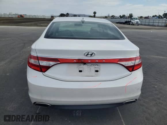2015 Hyundai Azera с VIN KMHFG4JGXFA440718, выставлен на аукционе Copart как лот 87485615 с пробегом 113 556 миль миль и Списание • Salvage title. История ставок и продаж доступна на DreamBid. Изображение 6.