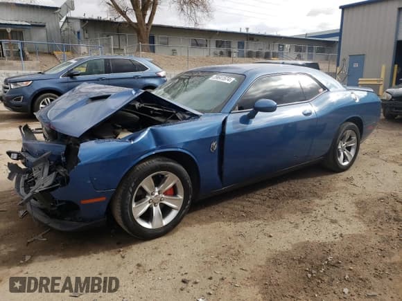 ✅ 2021 Dodge Challenger SXT • VIN: 2C3CDZAG0MH571513 • Lot: 39641574. Wystawiony na Copart z przebiegiem 58 487 mil. Bezpłatny archiwum sprzedaży aukcyjnych z USA i szczegółowy raport historii pojazdu na DreamBid. Zdjęcie 1.