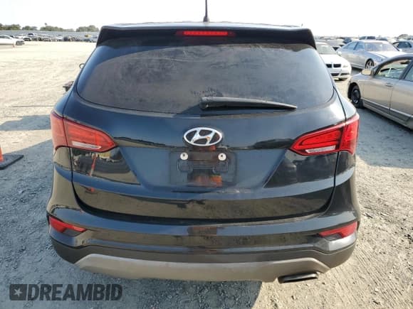 ✅ 2018 Hyundai Santa Fe 2.4L • VIN: 5NMZT3LB0JH095853 • Lot: 59963125. Listed on Copart with 128,186 mi. Free auction sales archive from the USA and detailed vehicle history report at DreamBid. Image 6.