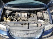 ✅ 2000 Chrysler Town & Country LX • VIN: 1C4GP44G5YB660690 • Lot: 48548595. Listed on Copart with 244,814 mi. Free auction sales archive from the USA and detailed vehicle history report at DreamBid. Image 14.