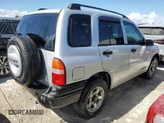 ✅ 1999 Chevrolet Tracker • VIN: 2CNBJ13C9X6920627 • Лот: 76997724. Опубликован ранее на Copart с пробегом Не указан. Бесплатный доступ к архиву аукционных продаж из США и подробный отчёт об истории автомобиля на DreamBid. Изображение 3.