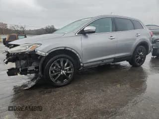 ✅ 2014 Mazda CX-9 Grand Touring • VIN: JM3TB2DA7E0441970 • Lot: 93404105. Wystawiony na Copart z przebiegiem 147 437 mil. Bezpłatny archiwum sprzedaży aukcyjnych z USA i szczegółowy raport historii pojazdu na DreamBid. Zdjęcie 1.