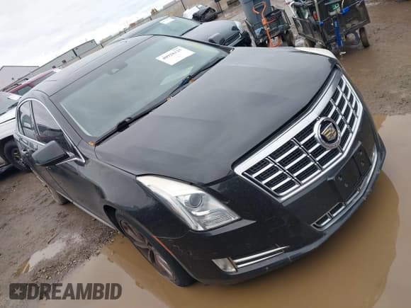✅ 2014 Cadillac XTS Luxury • VIN: 2G61M5S34E9192276 • Lot: 40928125. Listed on IAAI with 103,445 mi. Free auction sales archive from the USA and detailed vehicle history report at DreamBid. Image 1.