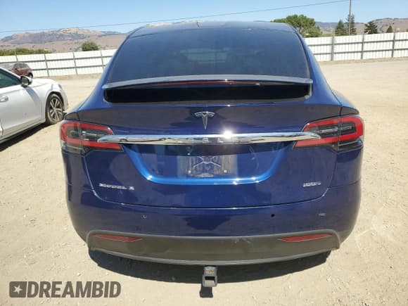 ✅ 2018 Tesla Model X 75D • VIN: 5YJXCBE23JF103458 • Лот: 69646965. Опубликован ранее на Copart с пробегом 99 232 миль. Бесплатный доступ к архиву аукционных продаж из США и подробный отчёт об истории автомобиля на DreamBid. Изображение 6.