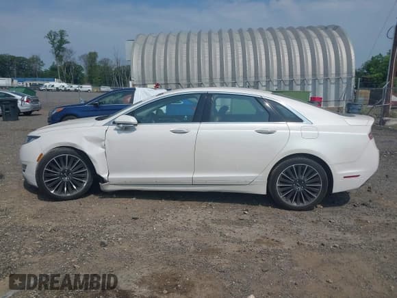 ✅ 2016 Lincoln MKZ • VIN: 3LN6L2JK8GR626690 • Lot: 42438226. Listed on IAAI with 51,678 mi. Free auction sales archive from the USA and detailed vehicle history report at DreamBid. Image 14.