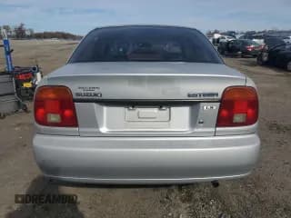 ✅ 2000 Suzuki Esteem GL • VIN: JS2GB41S8Y5184253 • Lot: 91134435. Wystawiony na Copart z przebiegiem 66 688 mil. Bezpłatny archiwum sprzedaży aukcyjnych z USA i szczegółowy raport historii pojazdu na DreamBid. Zdjęcie 6.