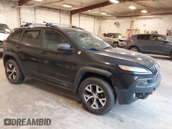 ✅ 2014 Jeep Cherokee Trailhawk • VIN: 1C4PJMBB1EW104938 • Лот: 43736578. Опубликован ранее на IAAI с пробегом 184 413 миль. Бесплатный доступ к архиву аукционных продаж из США и подробный отчёт об истории автомобиля на DreamBid. Изображение 1.