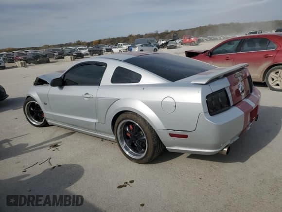 ✅ 2006 Ford Mustang GT Deluxe • VIN: 1ZVHT82H365203176 • Lot: 91623475. Listed on Copart with 122,497 mi. Free auction sales archive from the USA and detailed vehicle history report at DreamBid. Image 2.