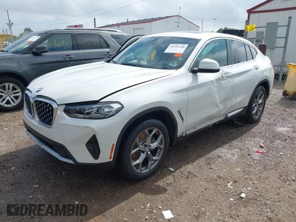 ✅ 2024 BMW X4 xDrive30i • VIN: 5UX33DT00R9U19867 • Lot: 43294120. Listed on IAAI with 23,564 mi. Free auction sales archive from the USA and detailed vehicle history report at DreamBid. Image 18.