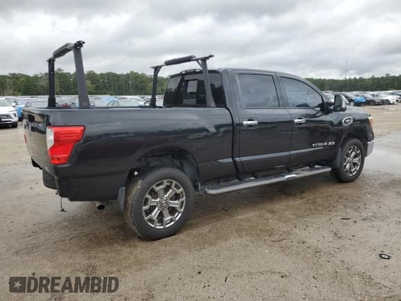 ✅ 2017 Nissan Titan SV • VIN: 1N6AA1F22HN564244 • Лот: 85832545. Опубликован ранее на Copart с пробегом 55 592 миль. Бесплатный доступ к архиву аукционных продаж из США и подробный отчёт об истории автомобиля на DreamBid. Изображение 3.