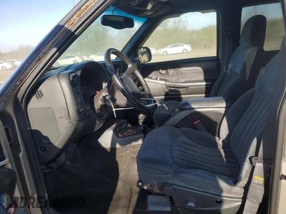 ✅ 1999 Chevrolet Blazer Trailblazer • VIN: 1GNDT13W0X2122216 • Lot: 54400065. Wystawiony na Copart z przebiegiem 100 260 mil. Bezpłatny archiwum sprzedaży aukcyjnych z USA i szczegółowy raport historii pojazdu na DreamBid. Zdjęcie 7.