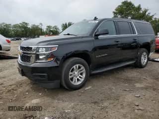 2019 Chevrolet Suburban LT with VIN 1GNSKHKC8KR335859, listed as a Copart auction lot 84557985 with 84,880 mi miles and Salvage title. Bid and sale history available at DreamBid. Image 1.