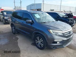 ✅ 2018 Honda Pilot EX-L • VIN: 5FNYF5H59JB027960 • Lot: 43543303. Listed on IAAI with 157,573 mi. Free auction sales archive from the USA and detailed vehicle history report at DreamBid. Image 1.