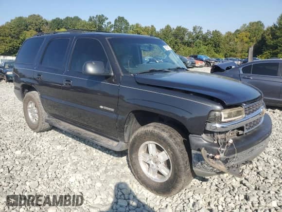 2003 Chevrolet Tahoe LT z VIN 1GNEK13Z13R135334, wystawiony jako Copart lot #81595775 z przebiegiem Nie podano mil oraz Szkoda całkowita • Salvage title. Historia ofert i sprzedaży dostępna na DreamBid. Obrazek 4.