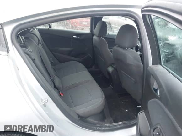 2017 Chevrolet Cruze LT z VIN 3G1BE6SMXHS582523, wystawiony jako IAAI lot #43559534 z przebiegiem 105 496 mil mil oraz . Historia ofert i sprzedaży dostępna na DreamBid. Obrazek 8.