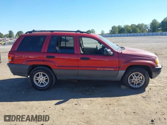 ✅ 2002 Jeep Grand Cherokee Laredo • VIN: 1J4GX48S62C257425 • Lot: 43435617. Listed on IAAI with 251,435 mi. Free auction sales archive from the USA and detailed vehicle history report at DreamBid. Image 13.