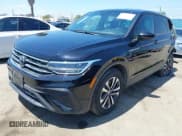 ✅ 2023 Volkswagen Tiguan S • VIN: 3VVRB7AX3PM064709 • Lot: 42103656. Listed on IAAI with 17,157 mi. Free auction sales archive from the USA and detailed vehicle history report at DreamBid. Image 2.